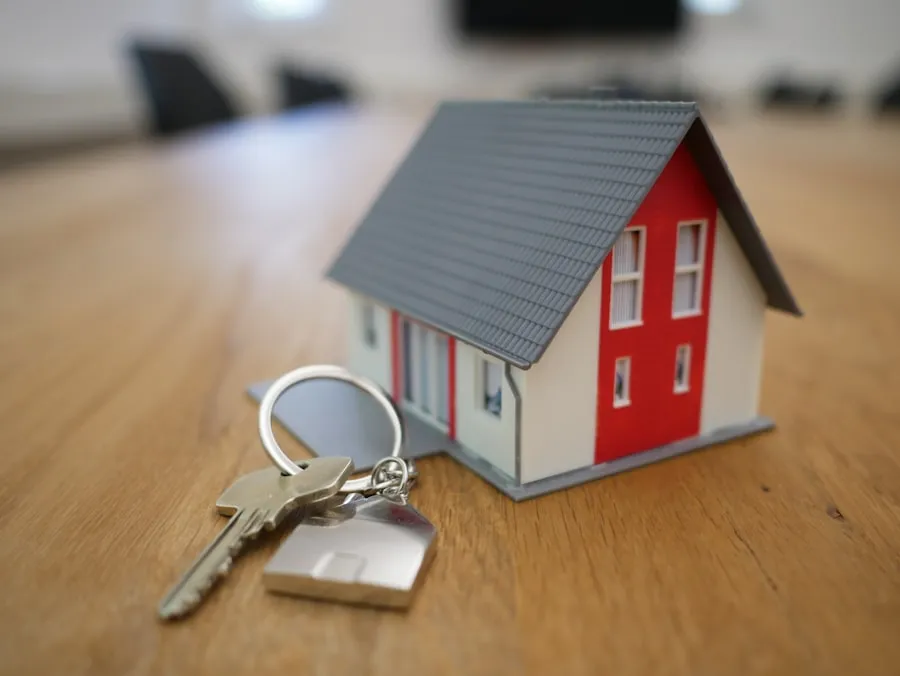 House keys resting beside a model home, representing a multi-unit Dubai portfolio